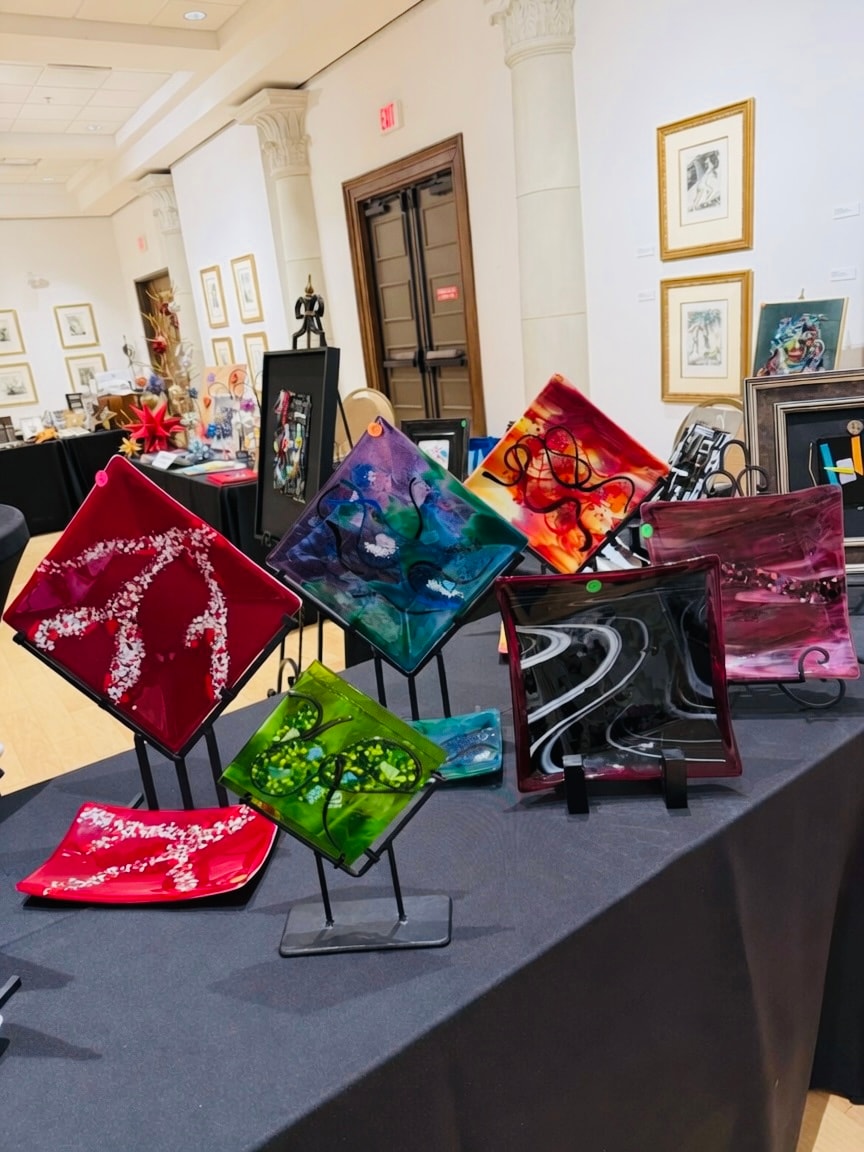 Cheri Toll fused glass plates on display at museum show